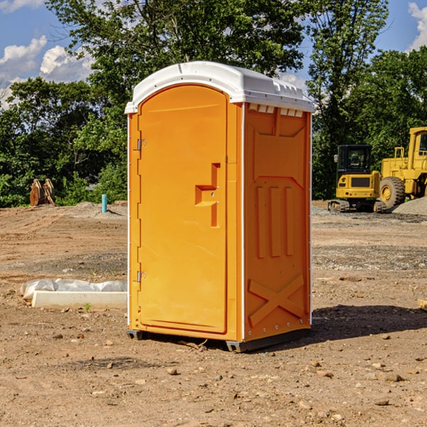 what is the cost difference between standard and deluxe portable restroom rentals in Byars